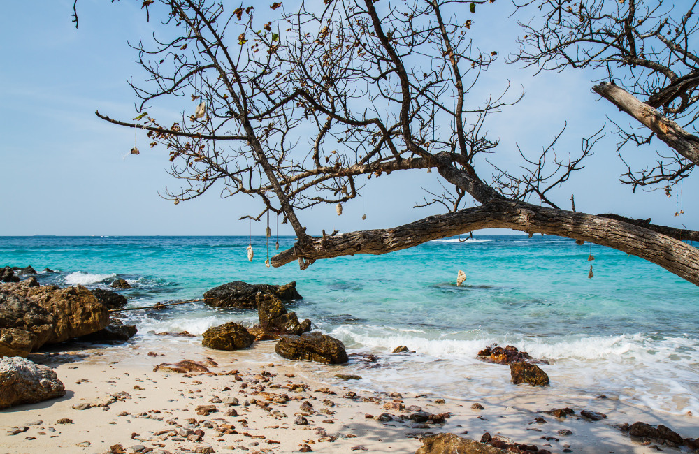 Clear turquoise waters and white sand at Koh Larn – popular island near Pattaya