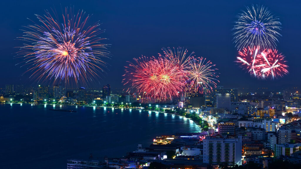 Spectacular fireworks display over Pattaya city skyline and beachfront during the Pattaya Fireworks Festival 2025.
