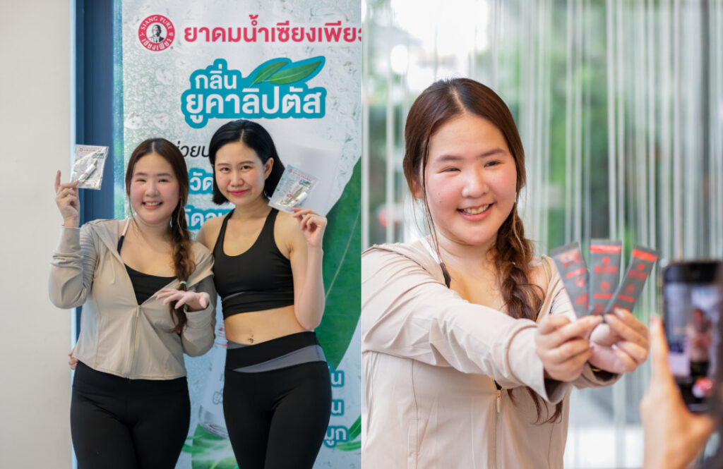 Participants pose with Siang Pure products, a wellness partner supporting the rooftop wellness community event in Pattaya.