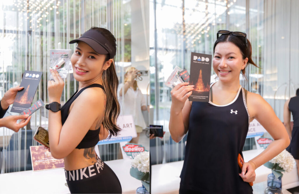 Participants showcase wellness gifts and PADO Media Art Space prizes at the Arbour rooftop event, celebrating community spirit within Pattaya’s wellness community.