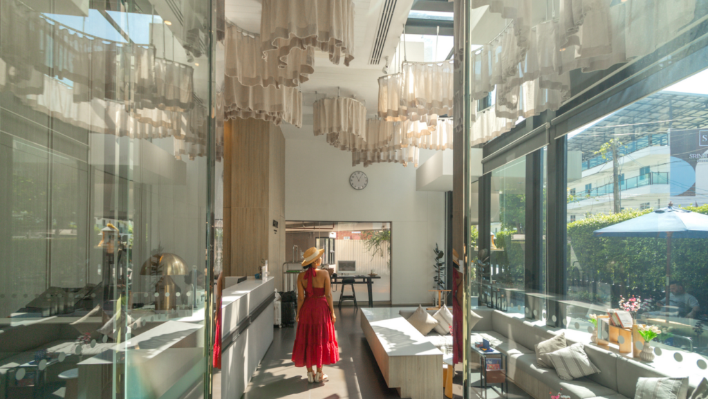 Modern lobby at Aster Hotel and Residence Pattaya with stylish interior, natural light, and welcoming atmosphere