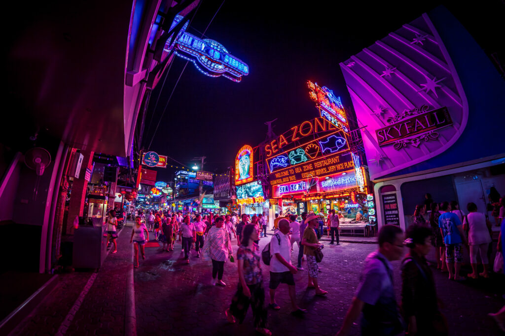 Vibrant night scene at Walking Street, a popular nightlife spot near Hotel Amber Pattaya, a top Pattaya hotel located conveniently close to the iconic attractions and entertainment district.