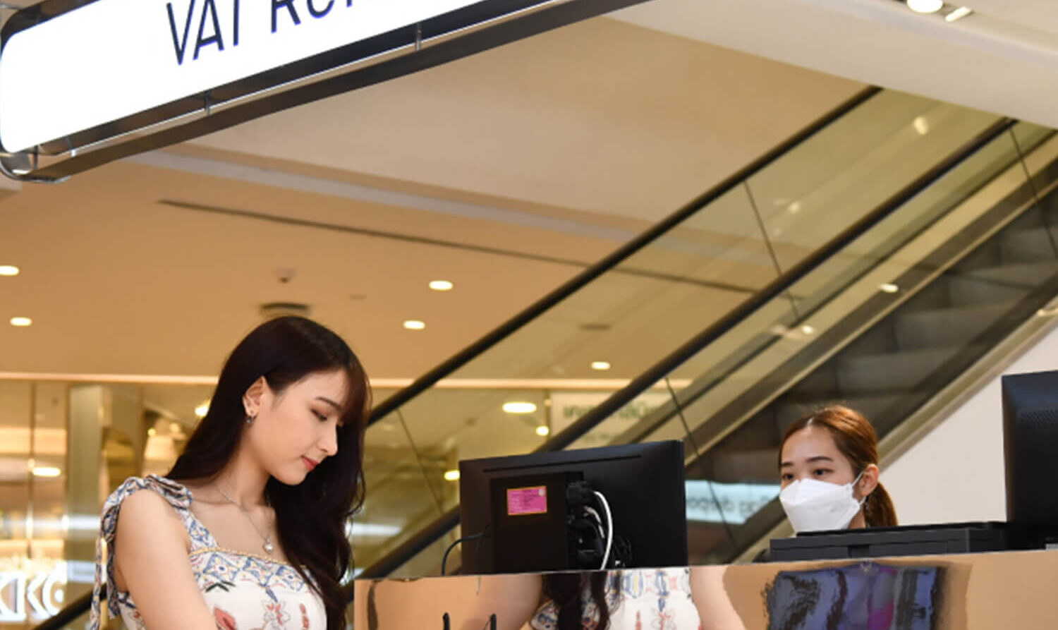 Tourist completing VAT refund at a shopping center near Hotel Amber Sukhumvit 85, a hotel located close to The Emporium in Bangkok.