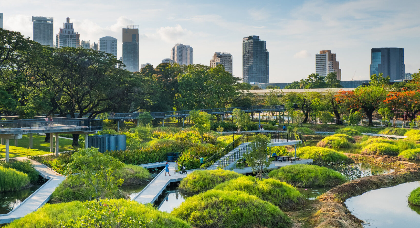 Benjakitti Park Bangkok with elevated walkways, wetlands, and skyline view – things to do in Benjakitti Park