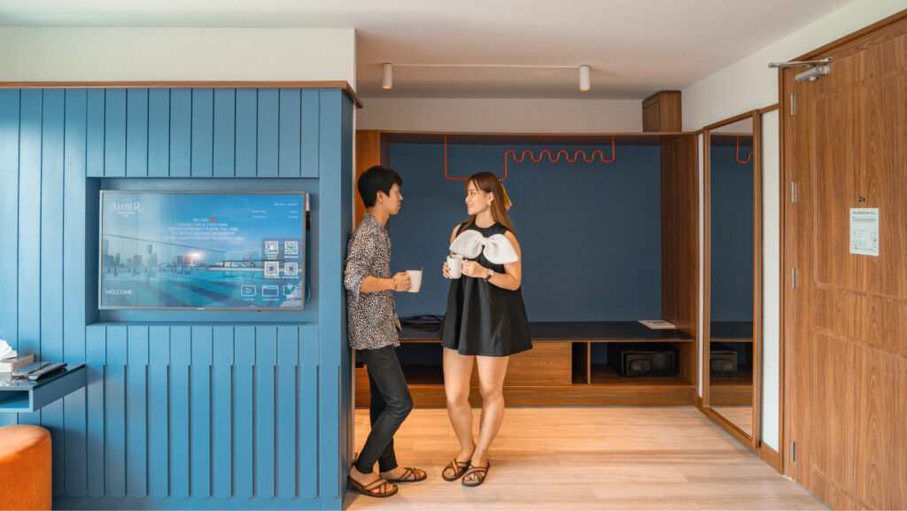 Guests relaxing at Hotel Amber Sukhumvit 85, perfect for those searching where to stay in Sukhumvit Bangkok with comfort and value.